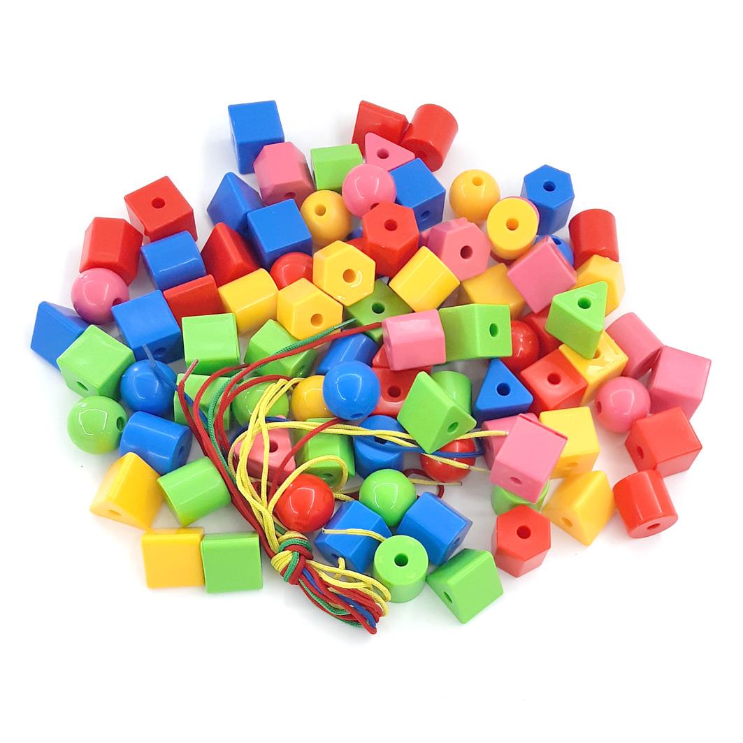 חרוזים גדולים להשחלה במיכל